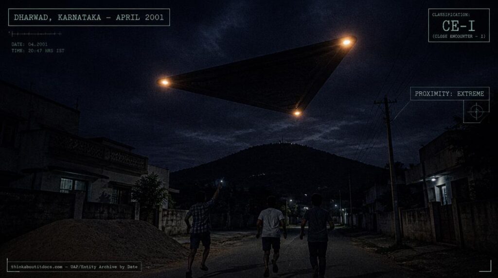 Illustration of the silent triangular craft with three corner lights reported low over a residential street in Dharwad, Karnataka, India in 2001
