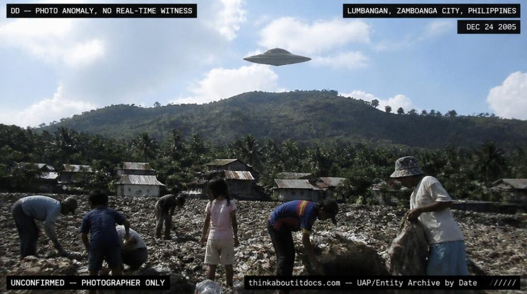 A dark metallic disc with a dome hovering above a hill in Lumbangan village, Zamboanga City, Philippines, December 2005