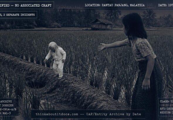 A miniature man with long white hair in a rice field diving into a hole in the ground, Rantau Panjang, Malaysia, 1972