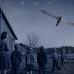 A man with silver wings hovers 200 feet above a Chehalis, Washington barn, watched by six witnesses, January 6, 1948