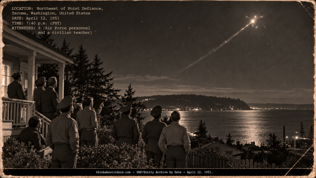 Nine people in a Tacoma yard watching a light with a silver trail shoot upward over Puget Sound, April 1951