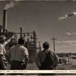 1950-style photo of workers at a power plant watching a bright silver disc over Pine Bluff, Arkansas